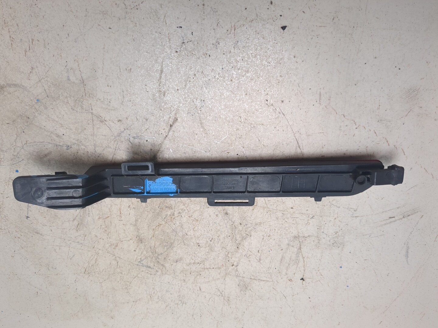 Отражатель в бампер задний левый