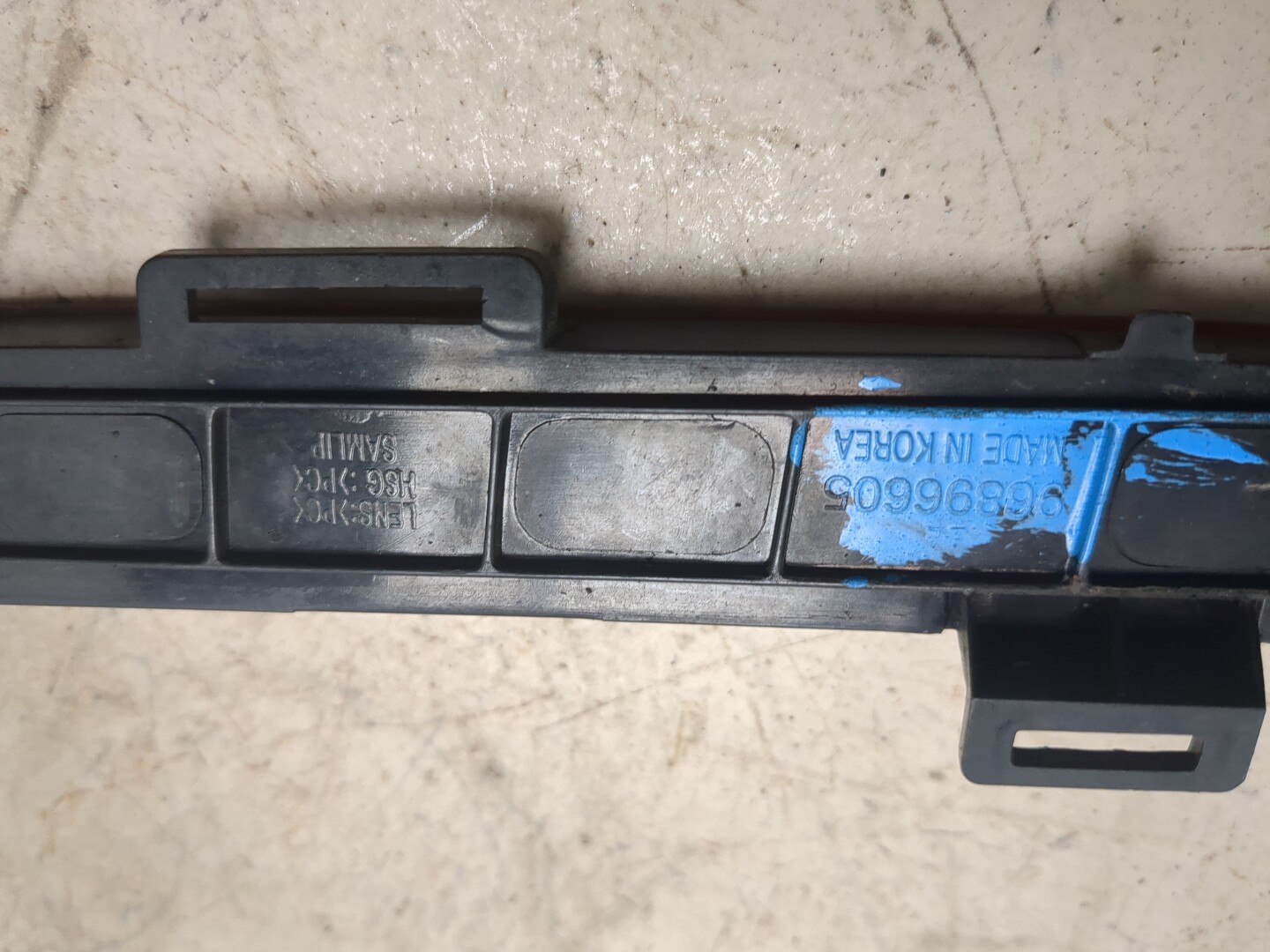 Отражатель в бампер задний левый