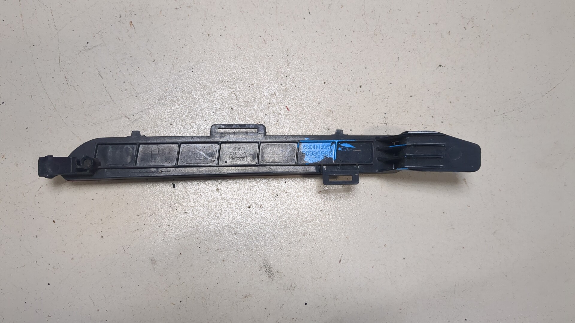 Отражатель в бампер задний левый