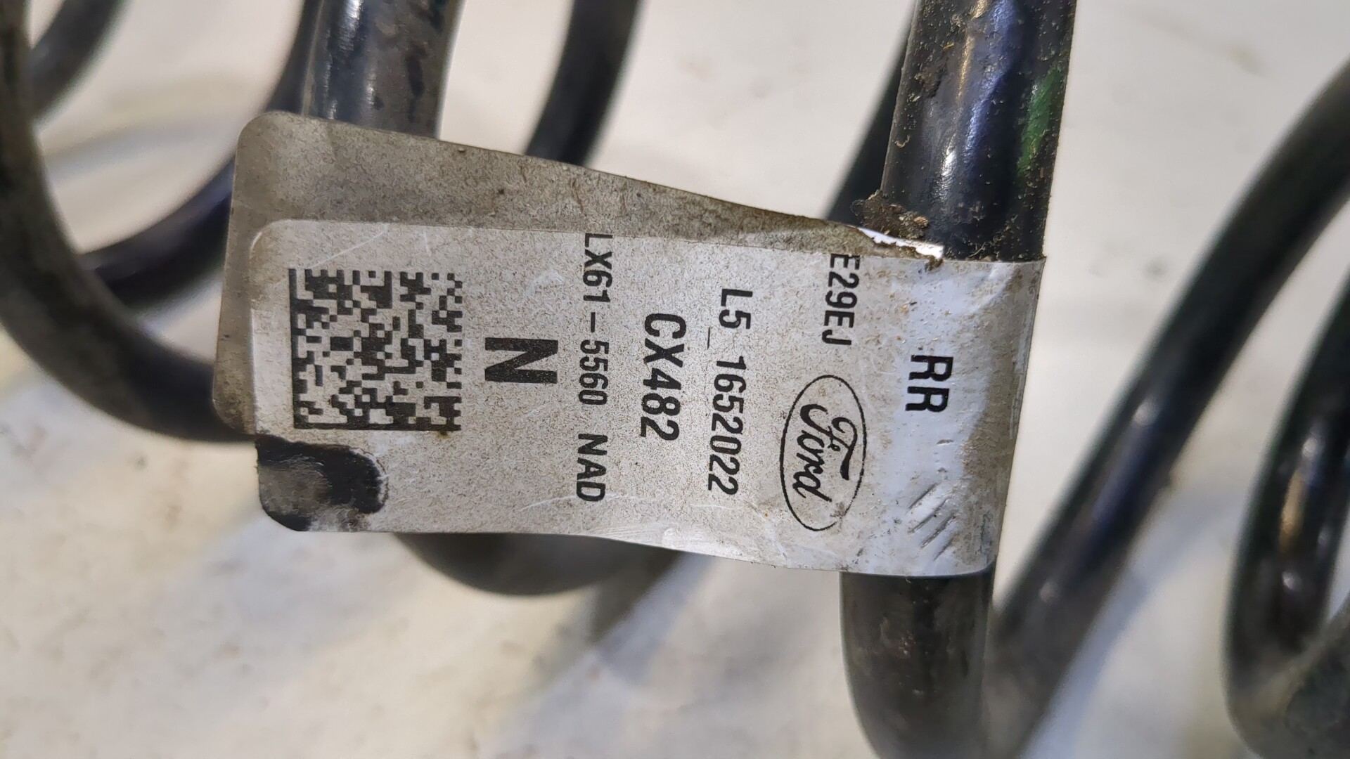 Пружина задняя