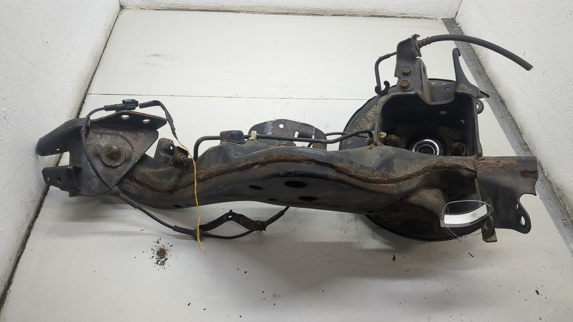 Кулак поворотный задний левый