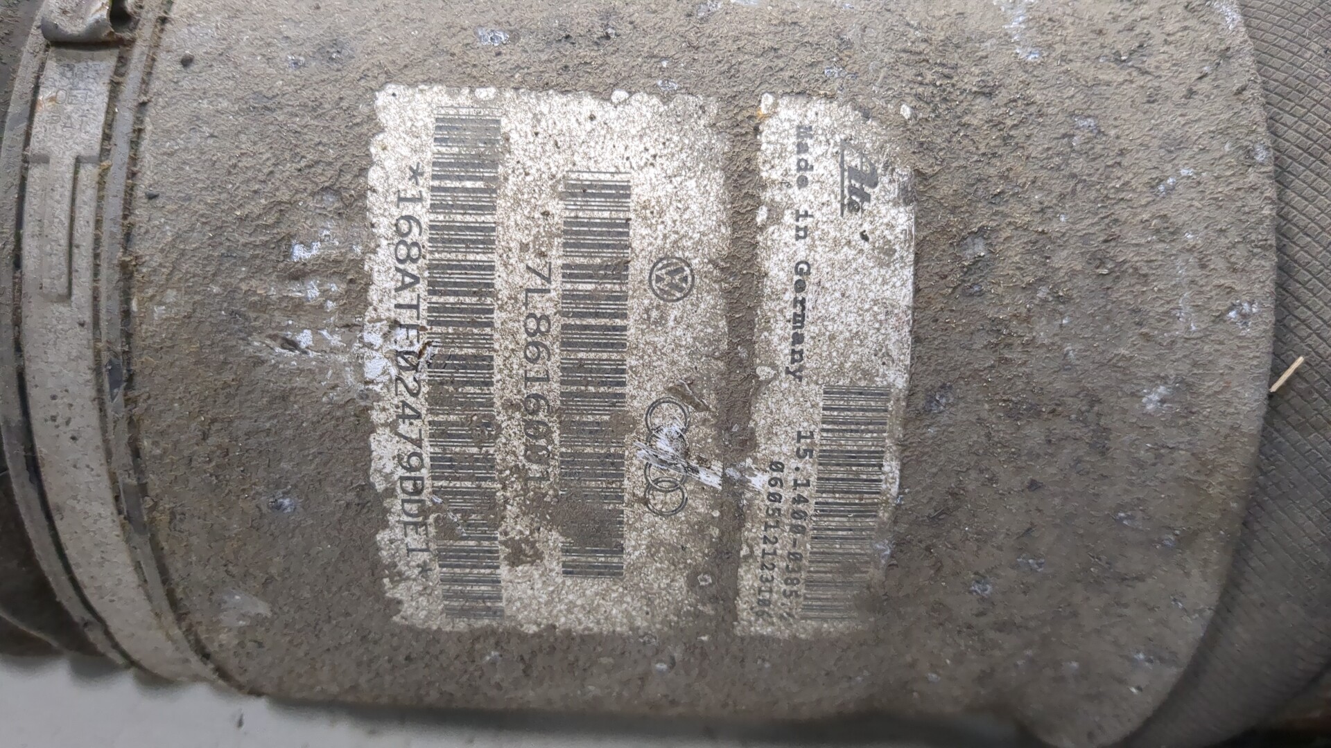 Амортизатор задний левый