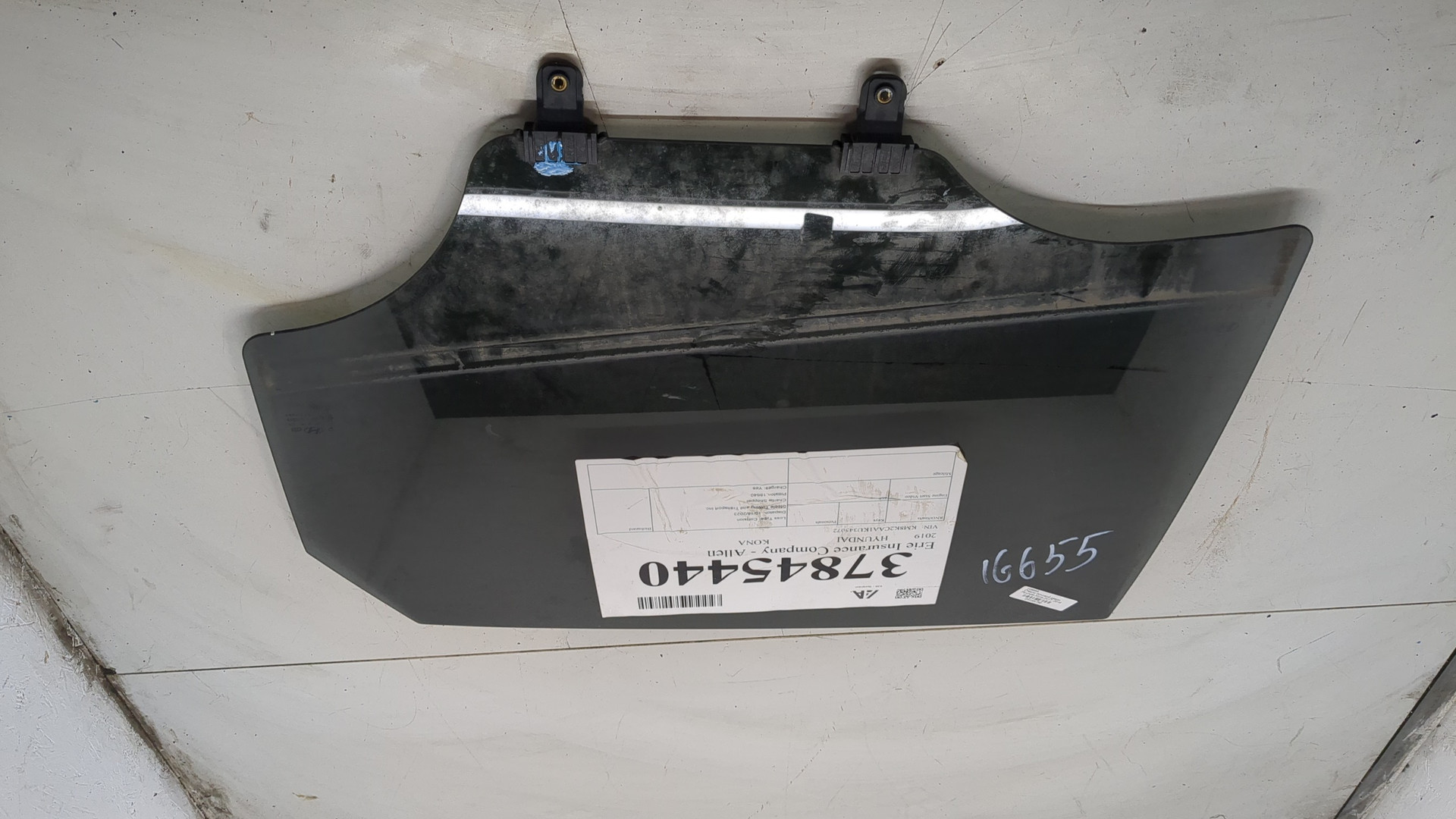 Стекло двери задней левой