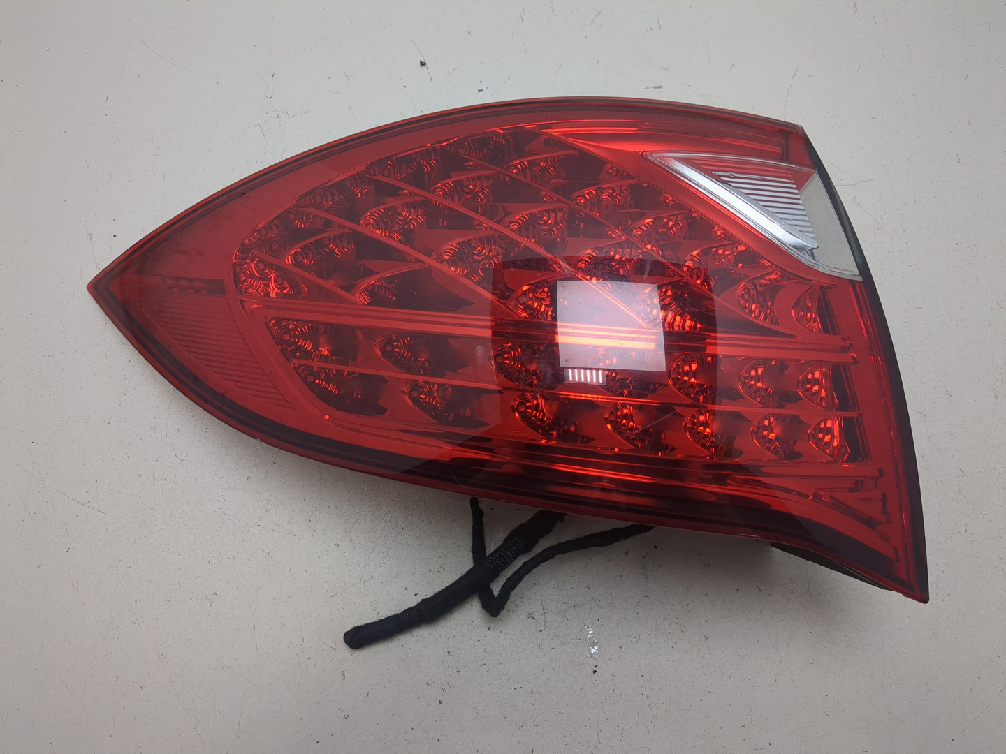 Фонарь задний левый