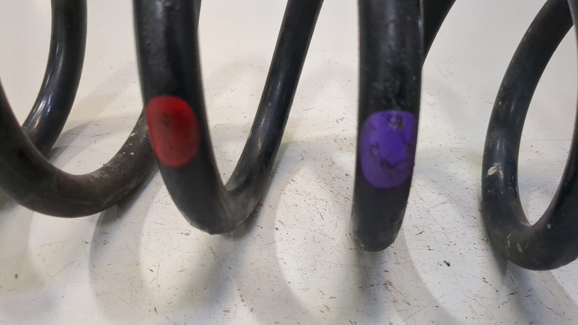 Пружина задняя