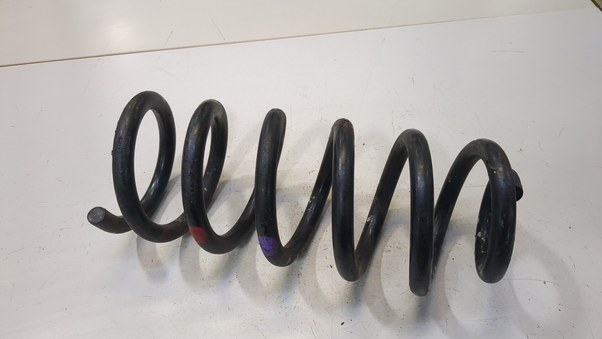 Пружина задняя