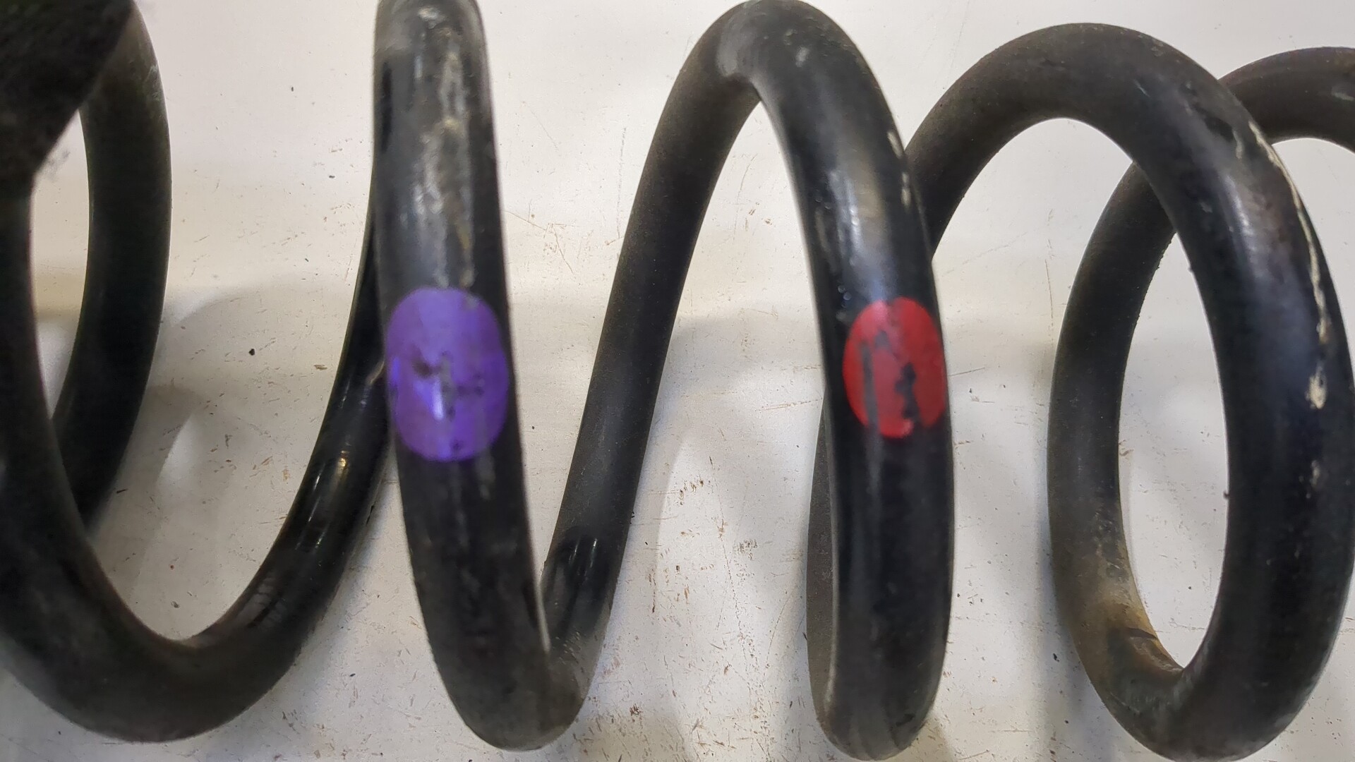 Пружина задняя