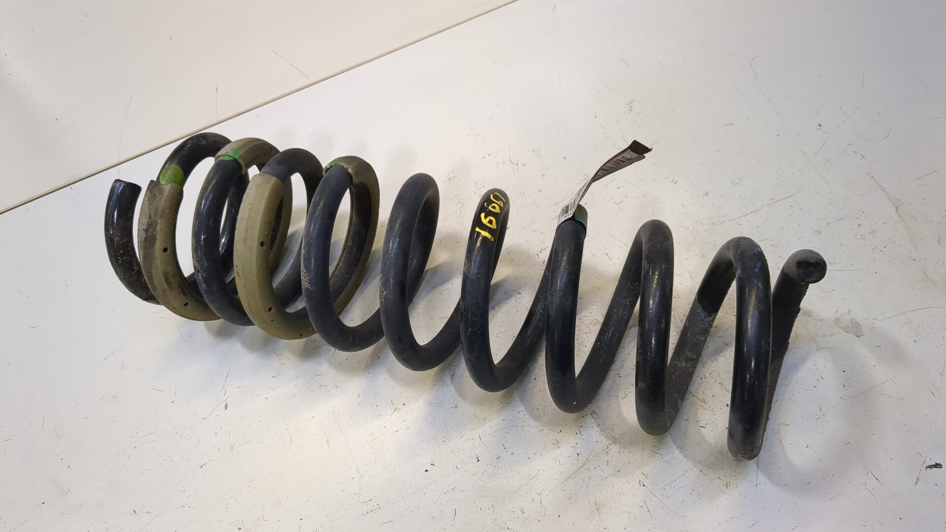 Пружина задняя