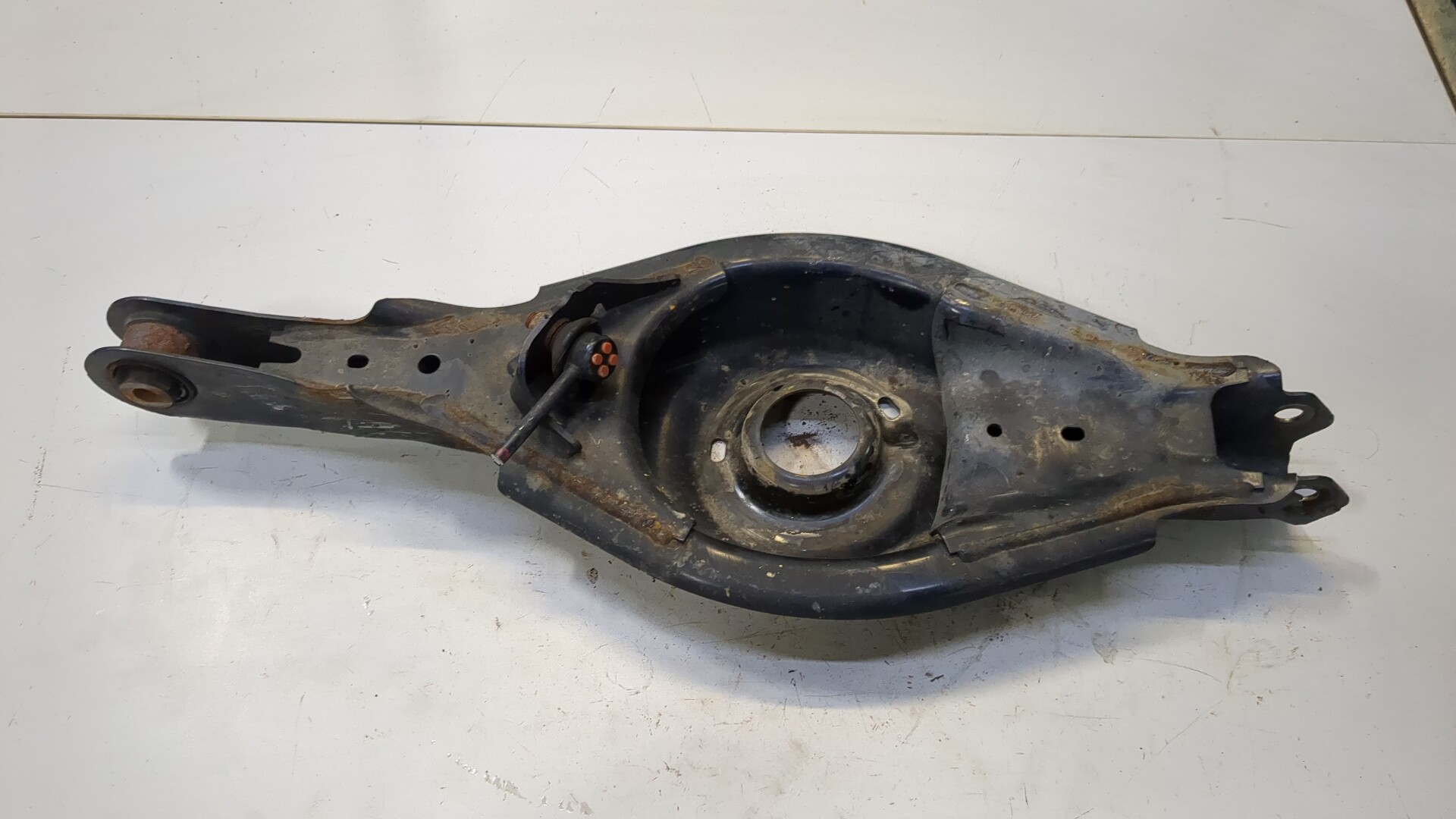 Рычаг задний левый