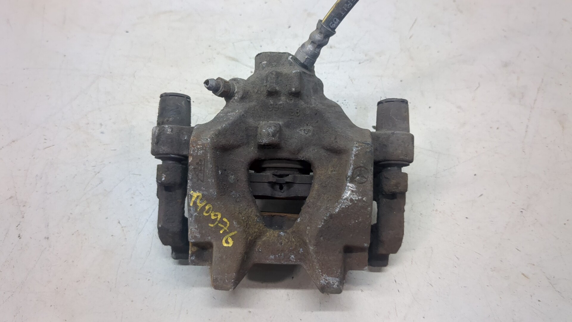 Суппорт задний левый