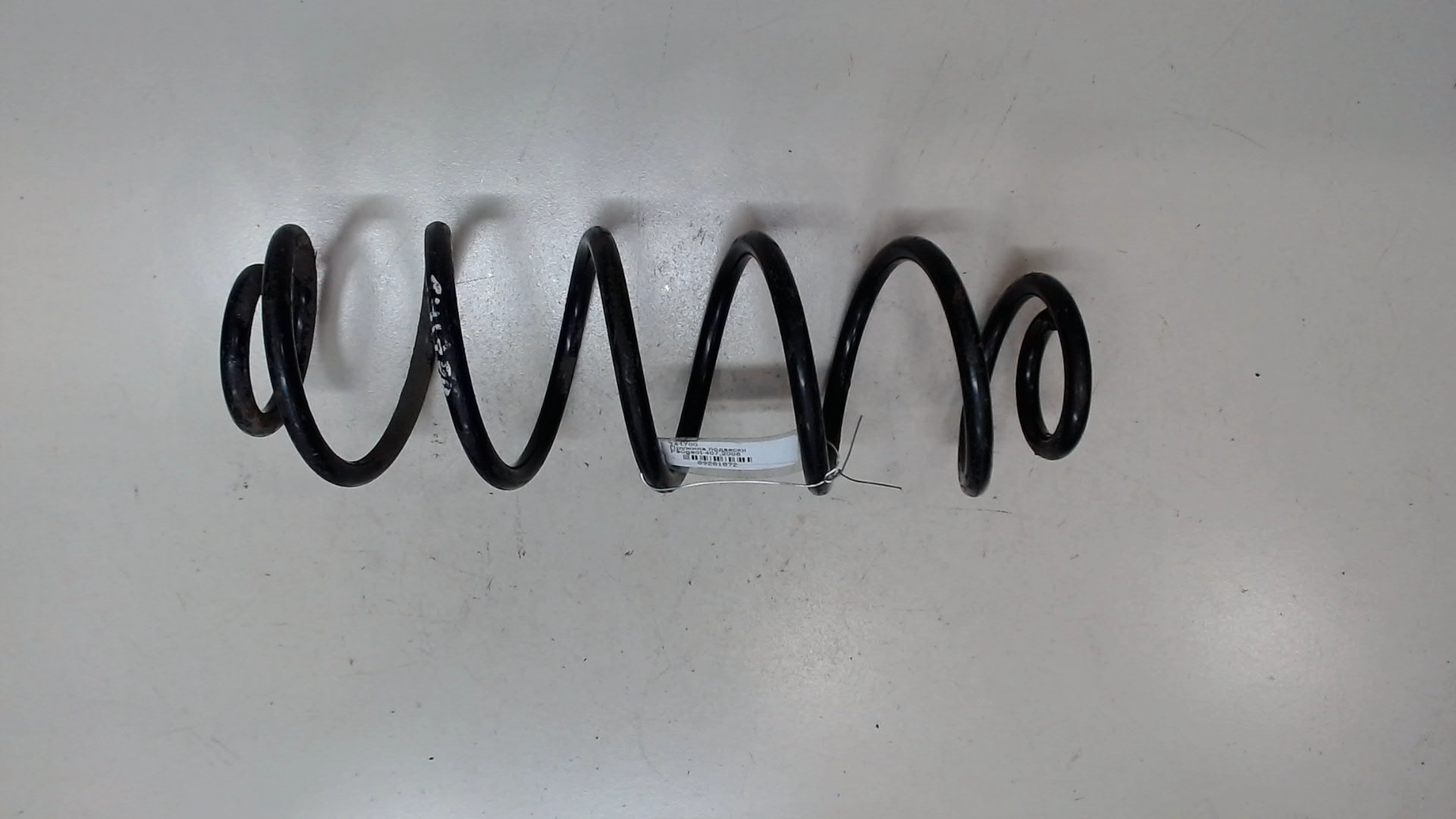 Пружина задняя