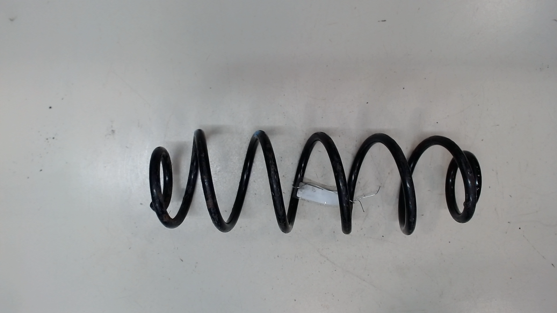 Пружина задняя