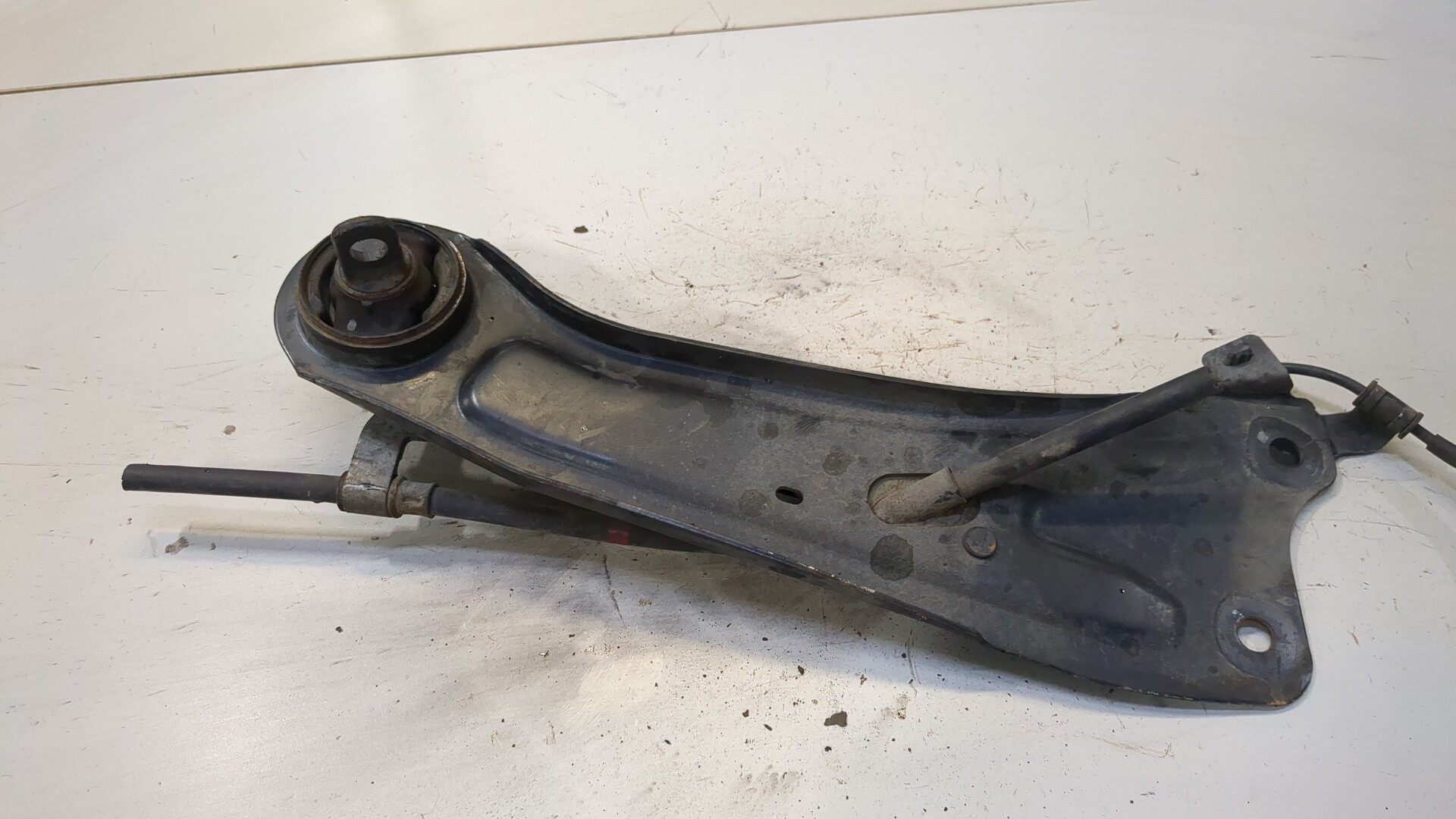 Рычаг задний левый