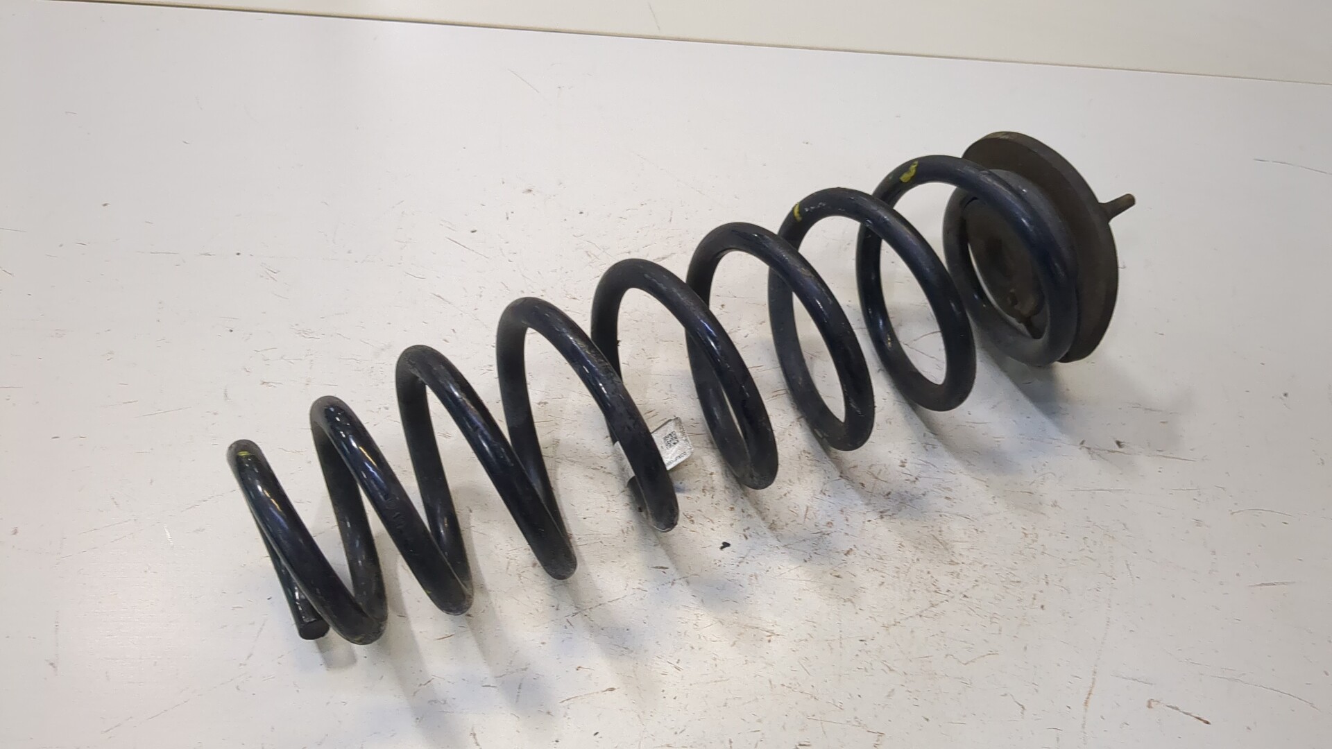 Пружина задняя