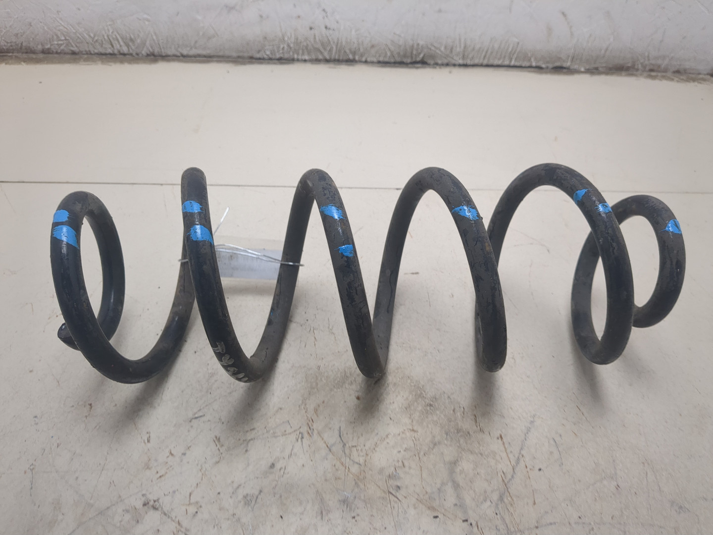 Пружина задняя