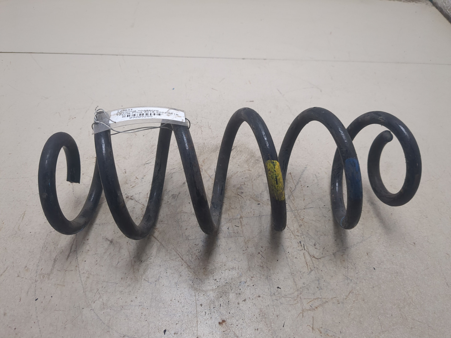 Пружина задняя