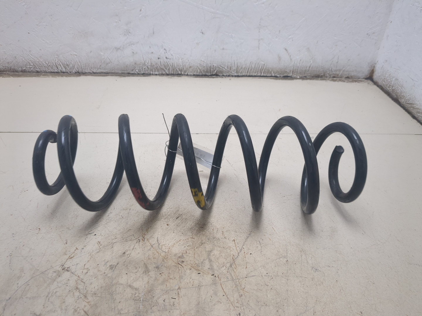 Пружина задняя