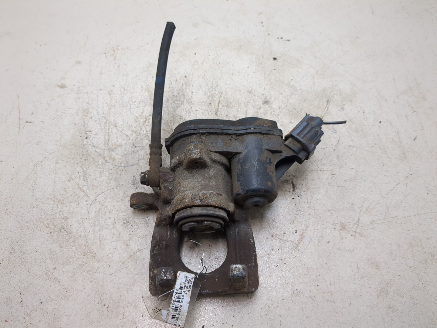 Суппорт задний левый