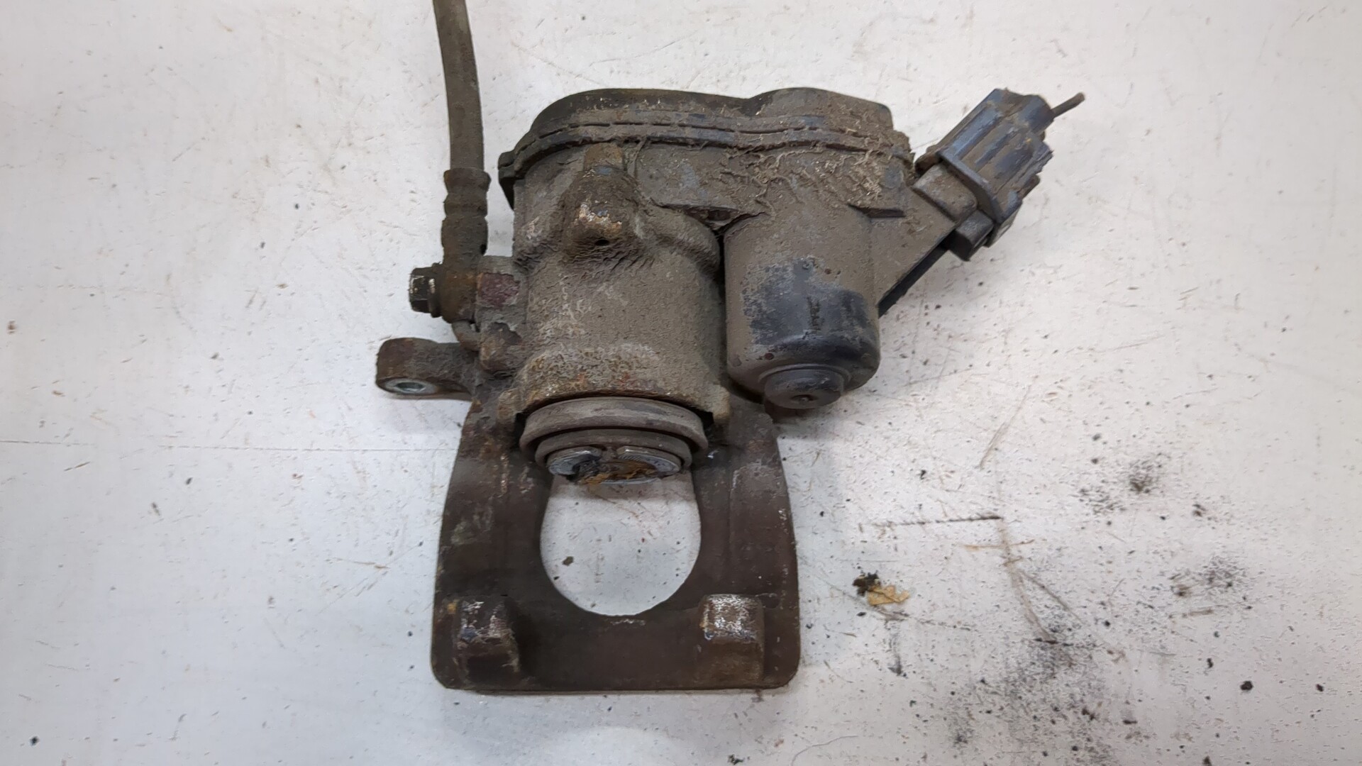 Суппорт задний левый