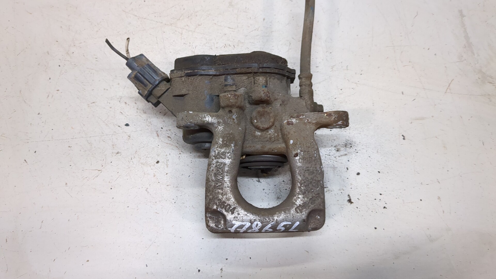 Суппорт задний левый