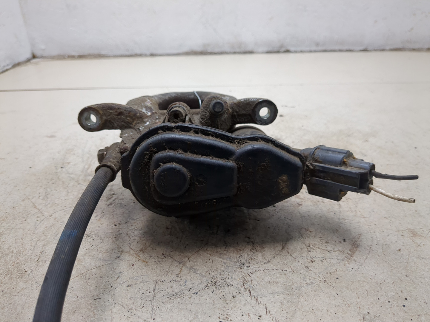 Суппорт задний левый