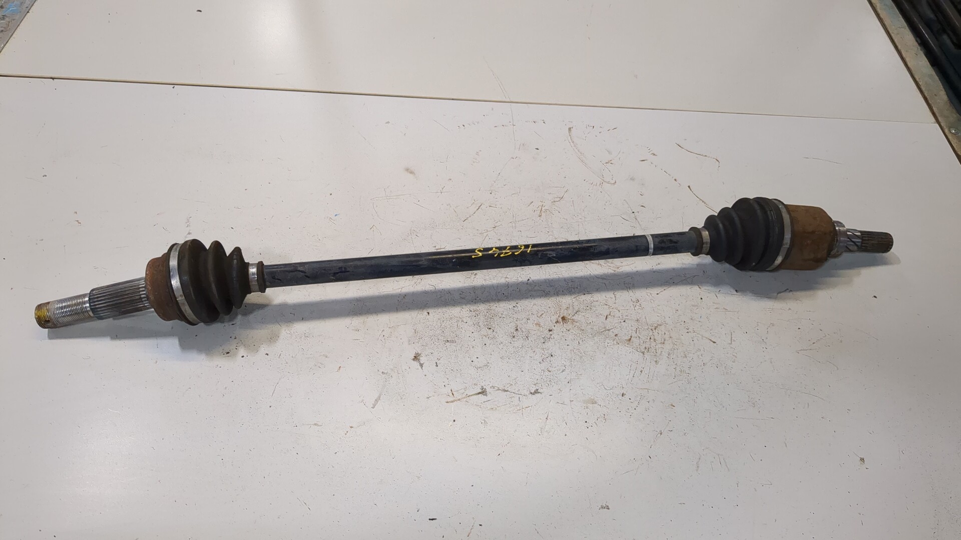 Полуось задняя левая