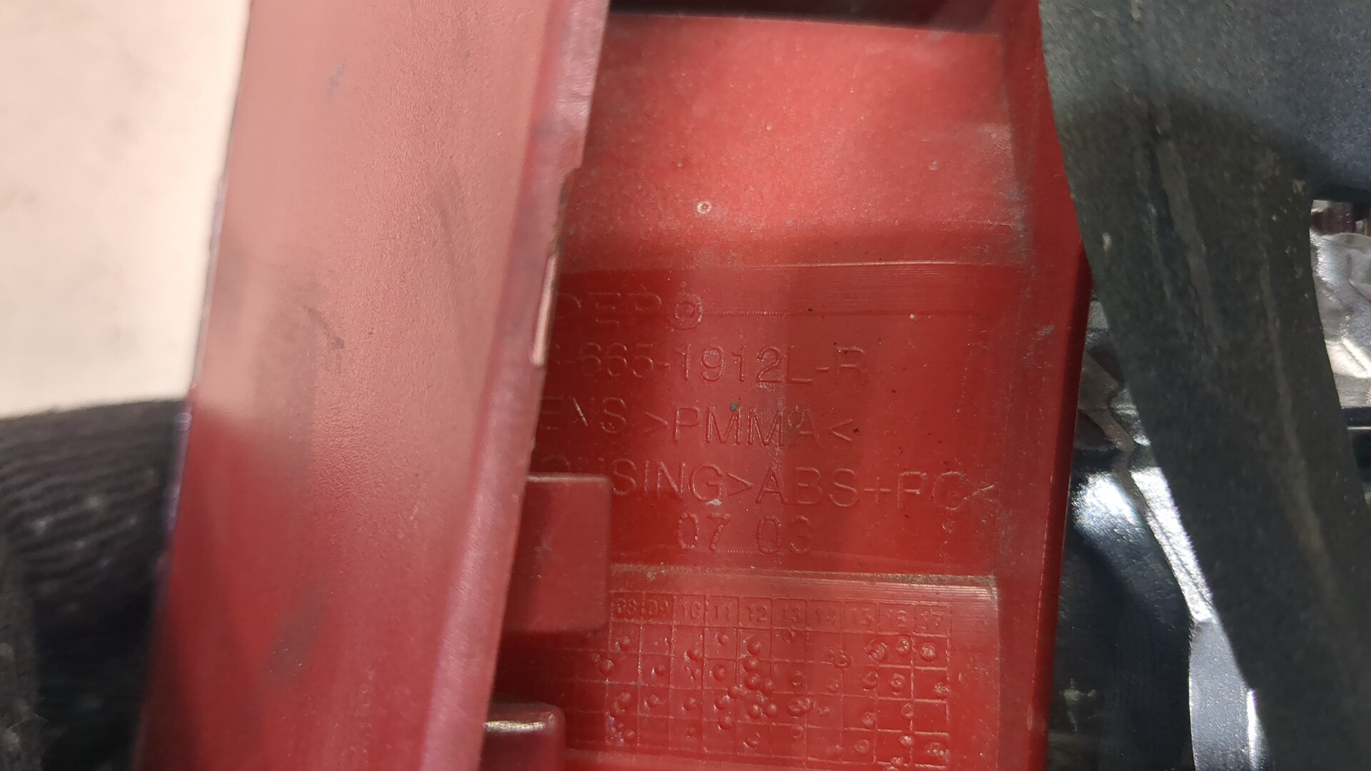 Фонарь задний левый