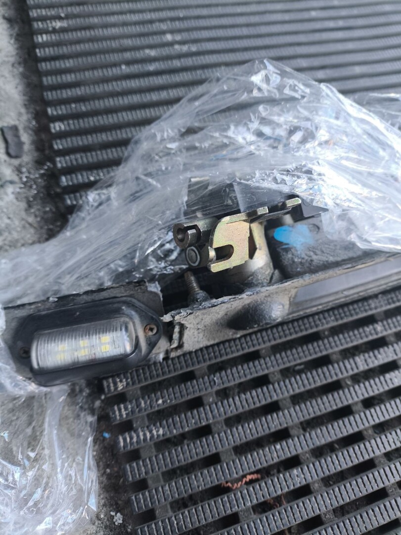 Фонарь подсветки номера