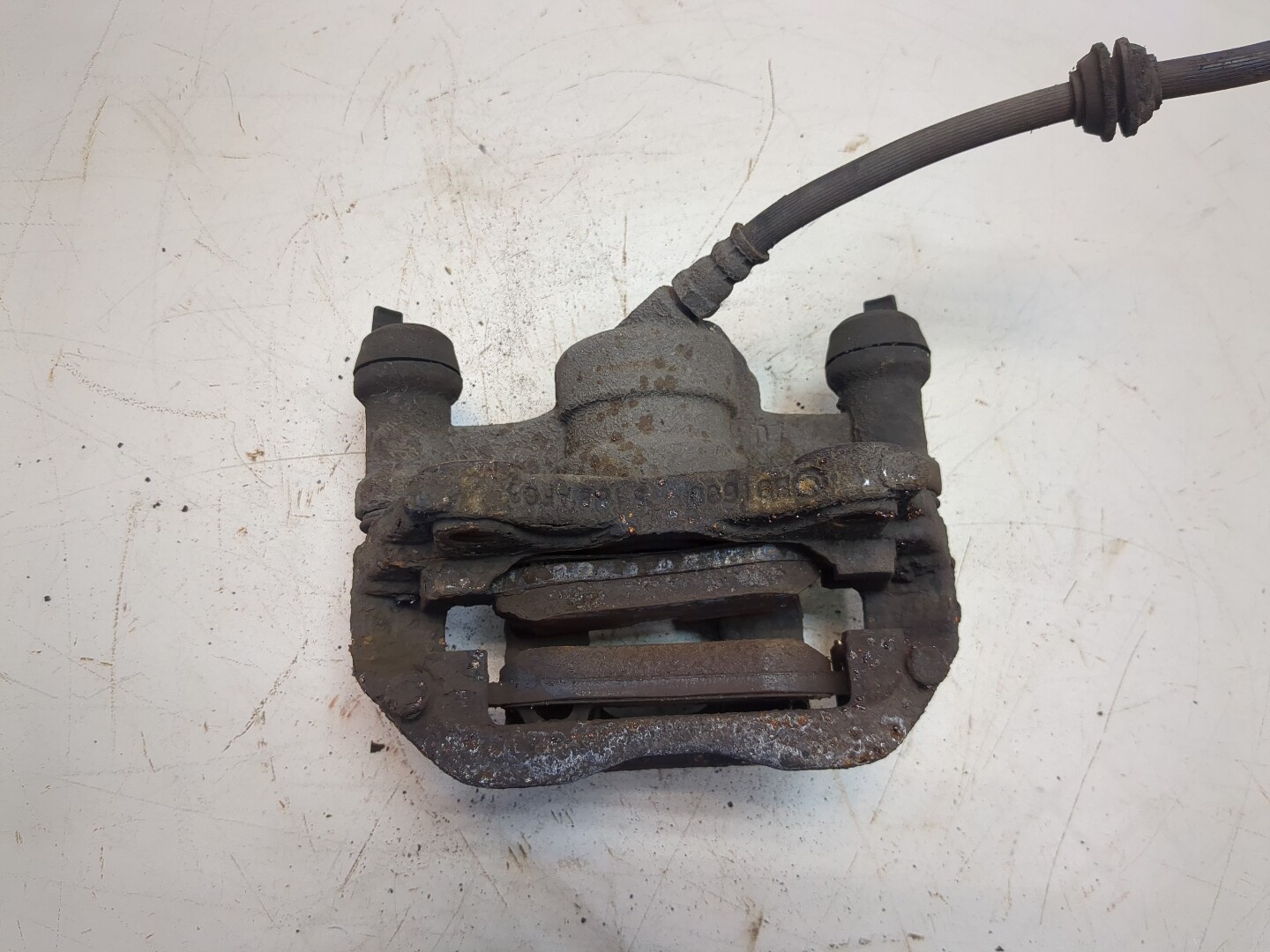 Суппорт передний левый