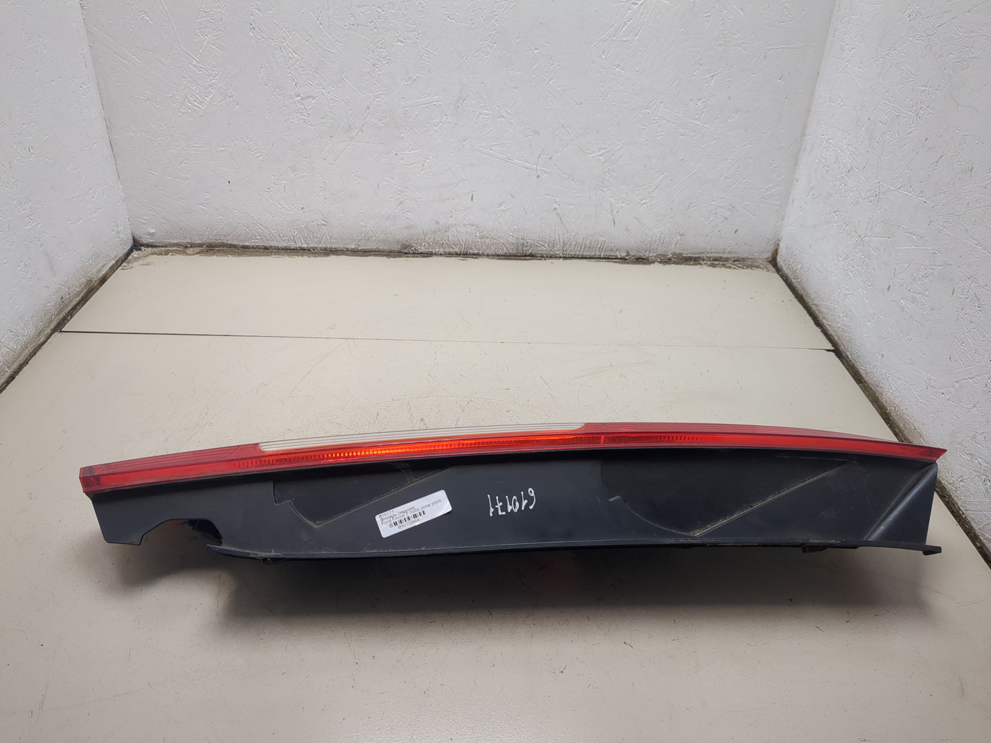 Фонарь задний левый