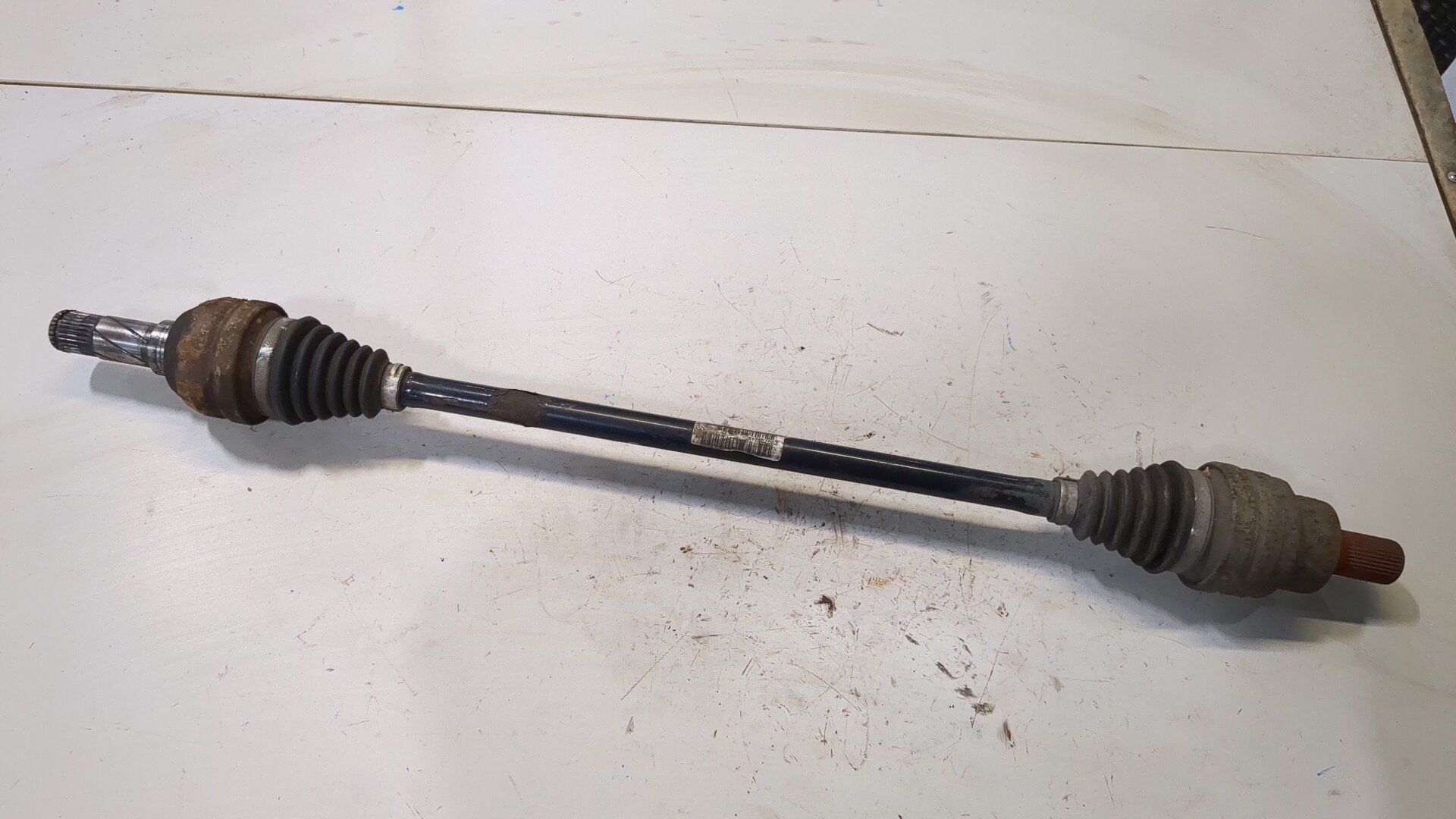 Полуось задняя левая