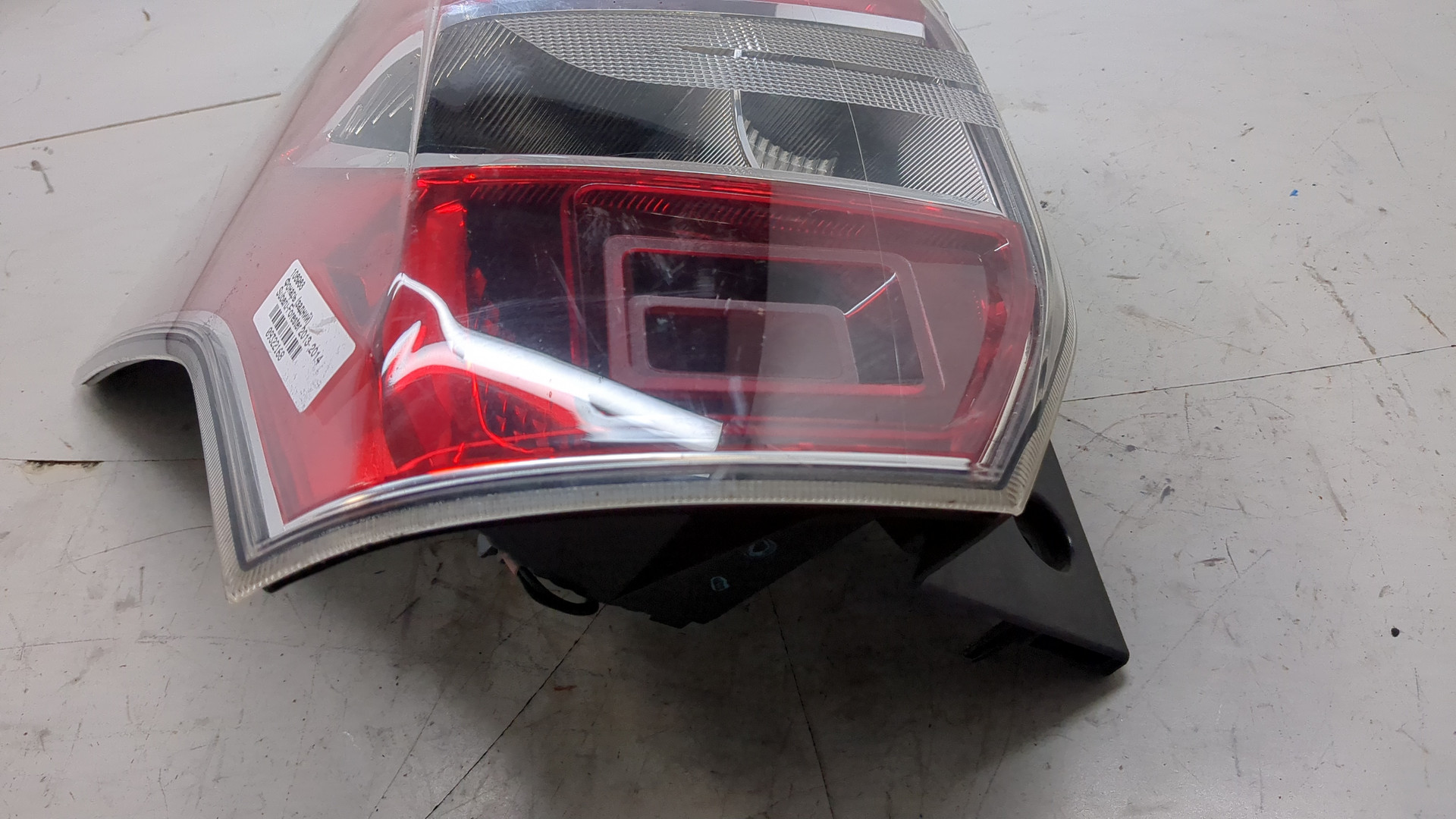 Фонарь задний левый