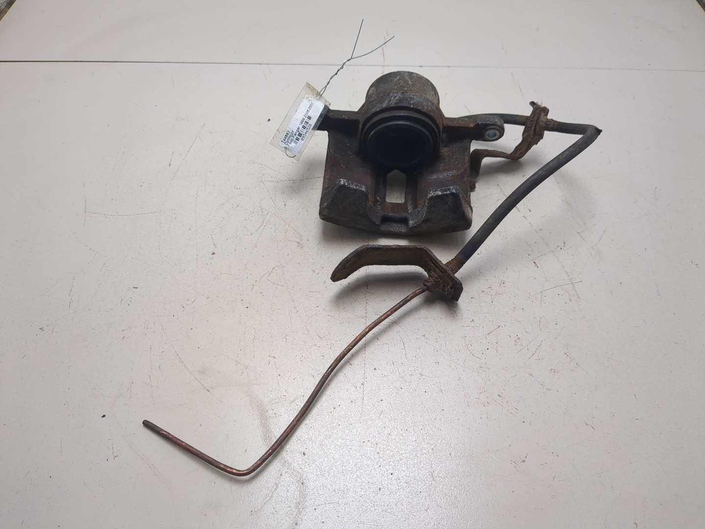 Суппорт передний левый