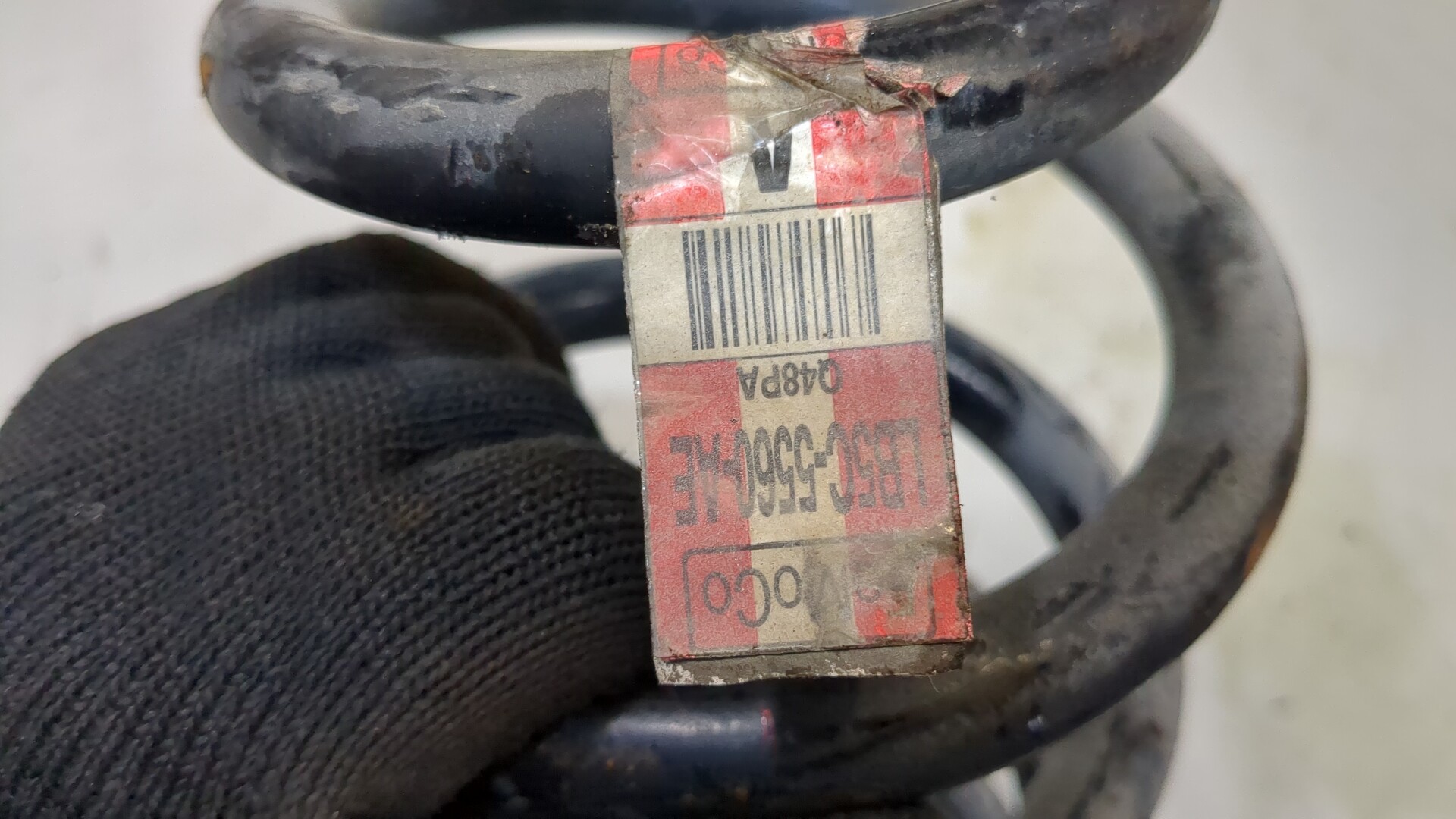 Пружина задняя