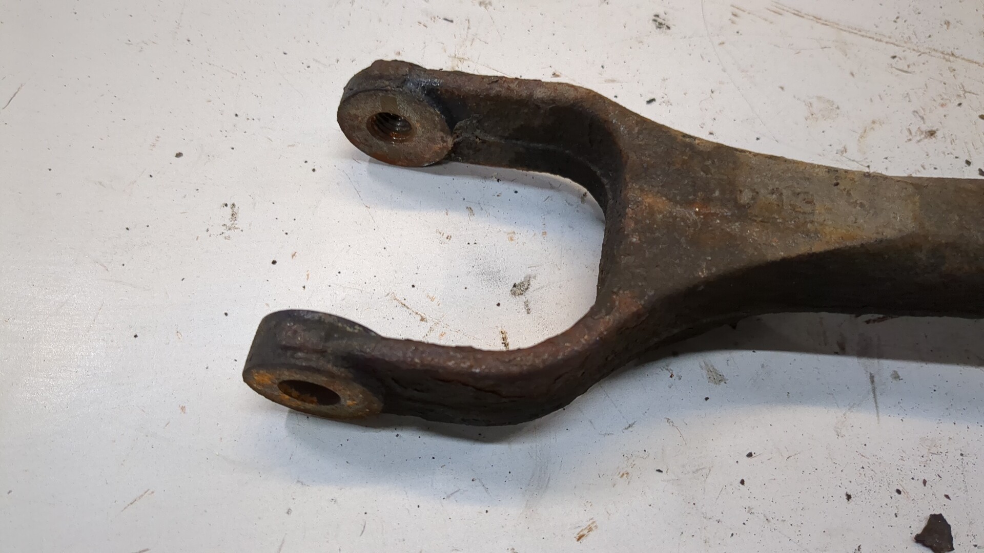 Рычаг задний левый