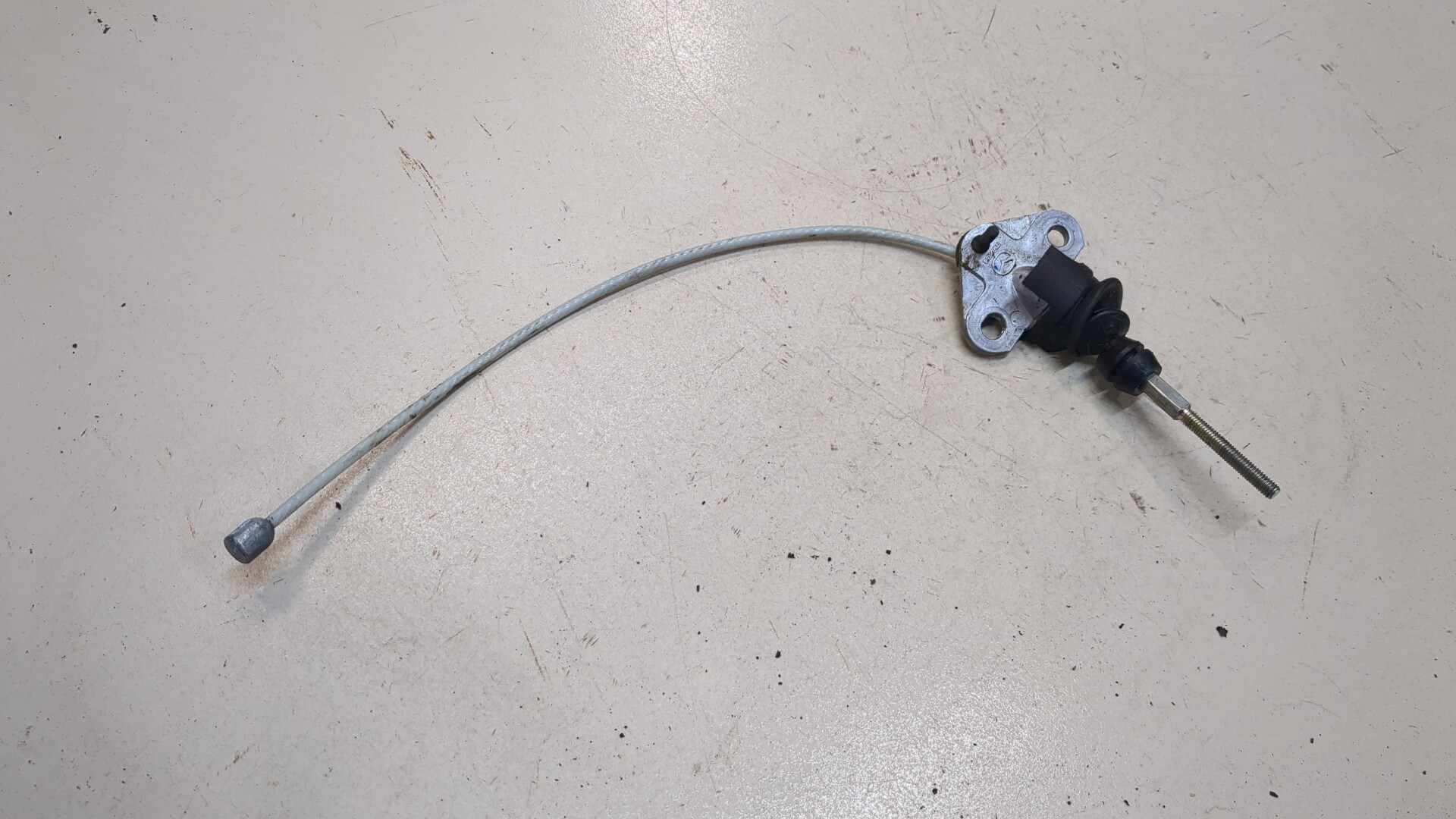 Трос стояночного тормоза