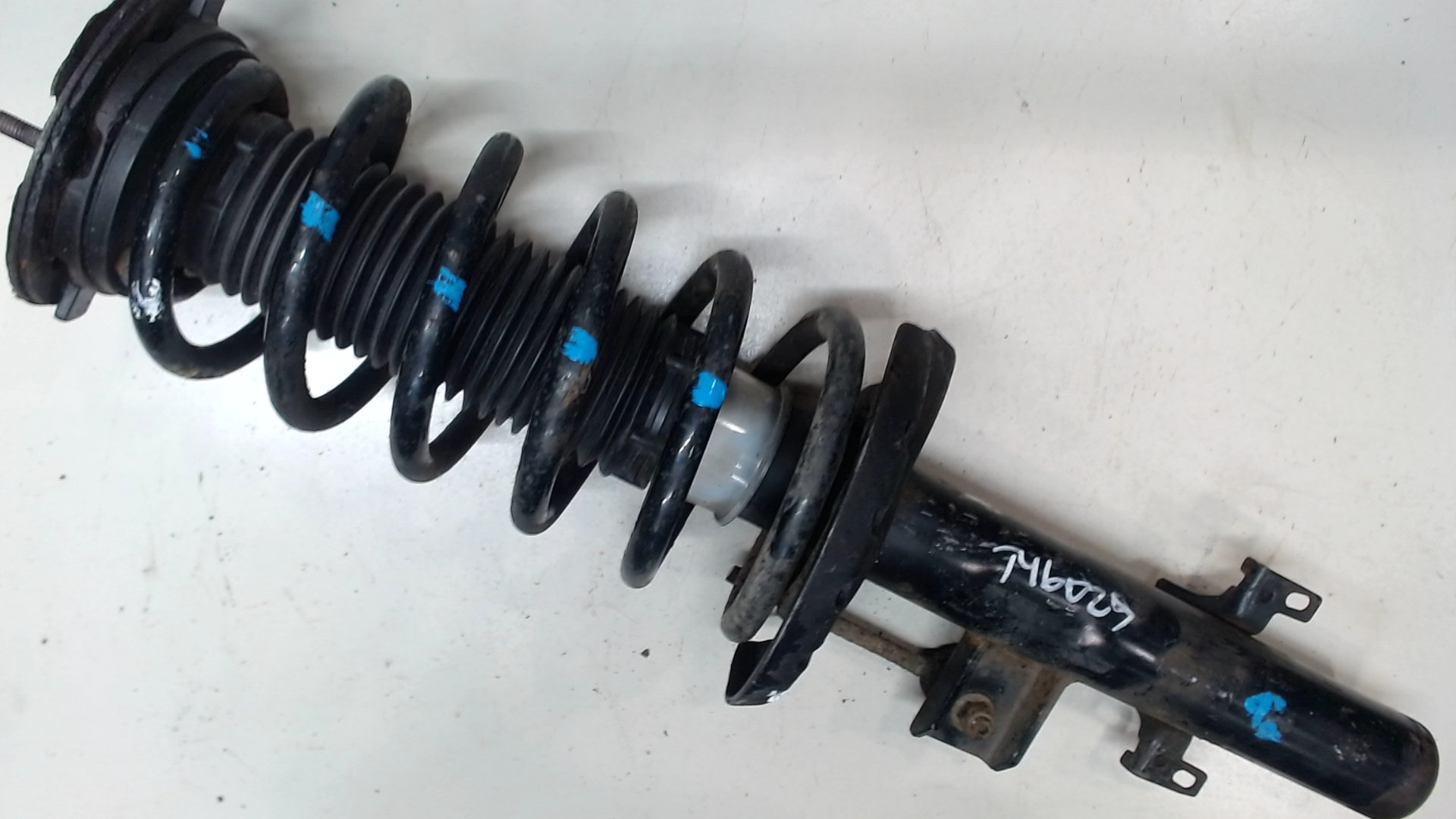 Амортизатор задний левый