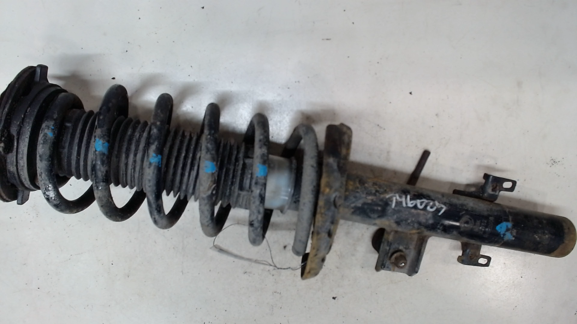 Амортизатор задний левый