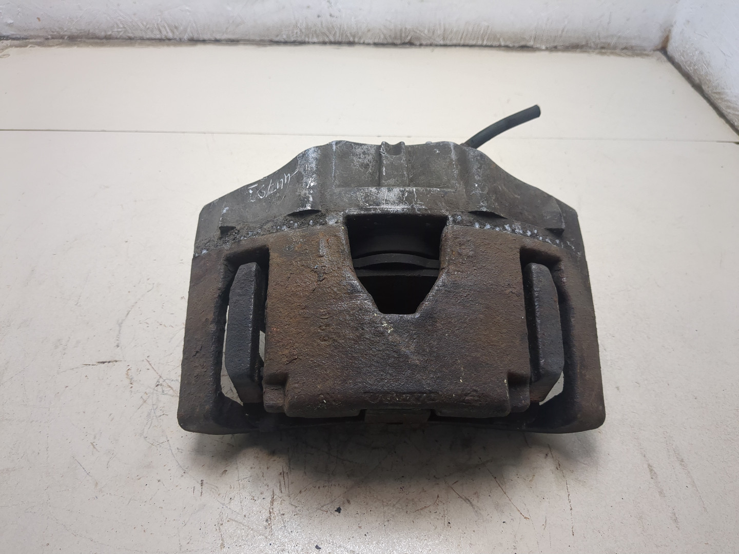 Суппорт передний левый