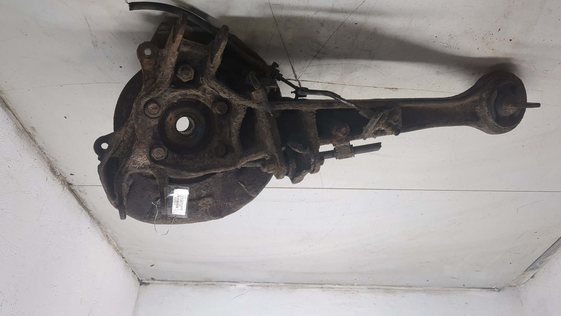 Кулак поворотный задний левый