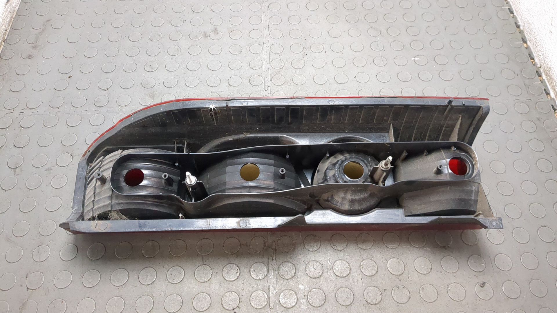 Фонарь задний левый