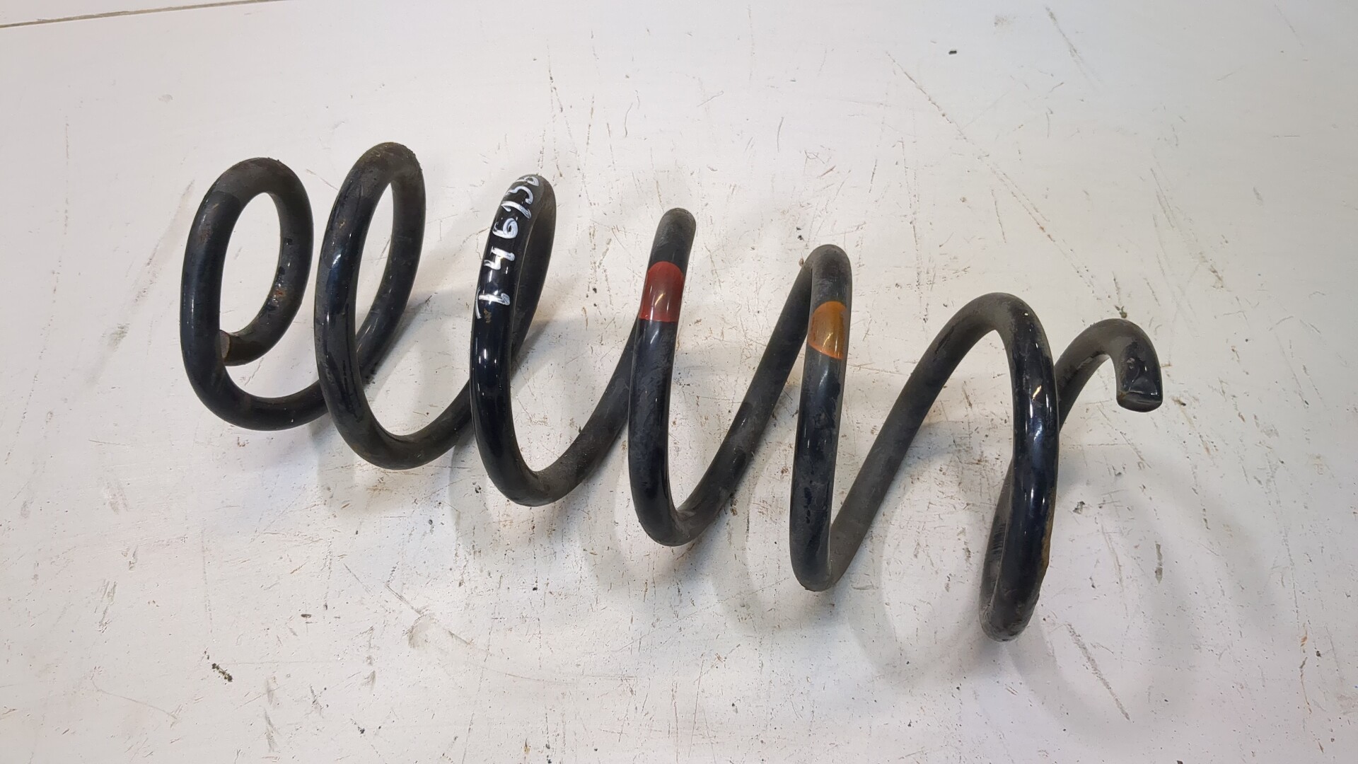 Пружина задняя