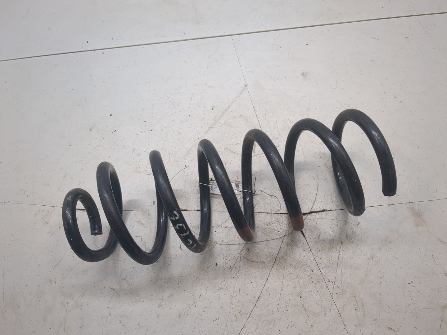 Пружина задняя