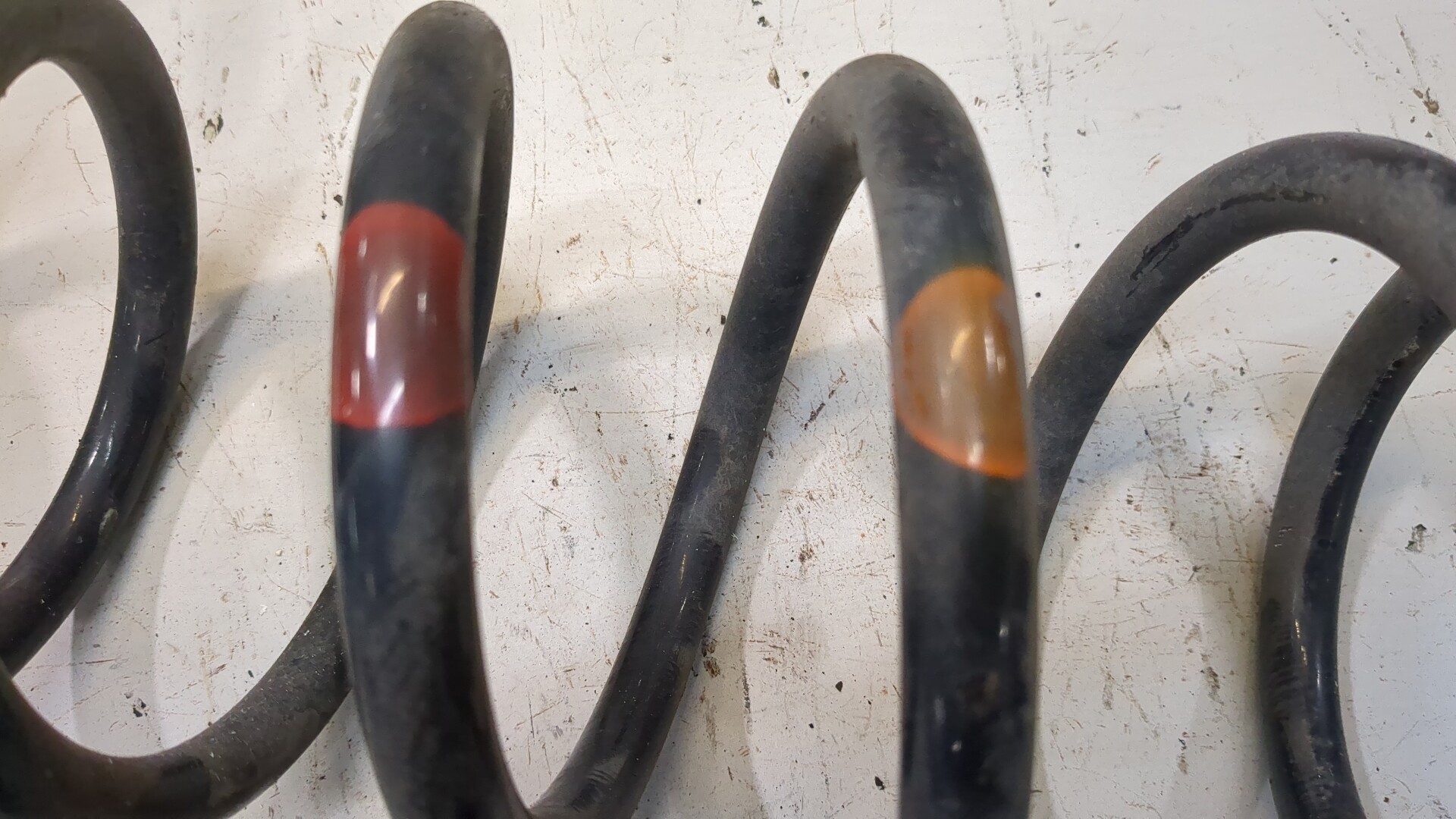 Пружина задняя