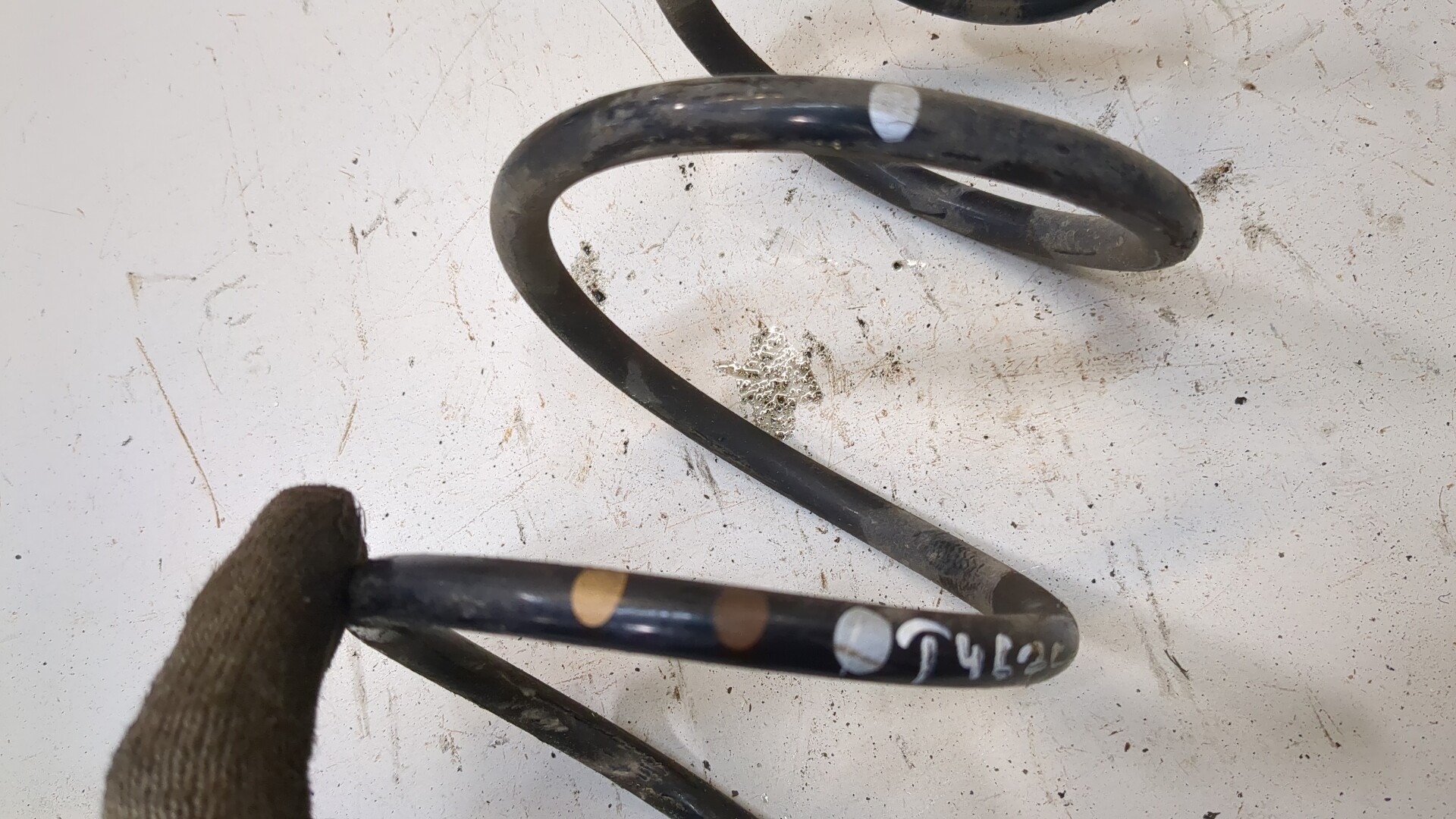 Пружина задняя