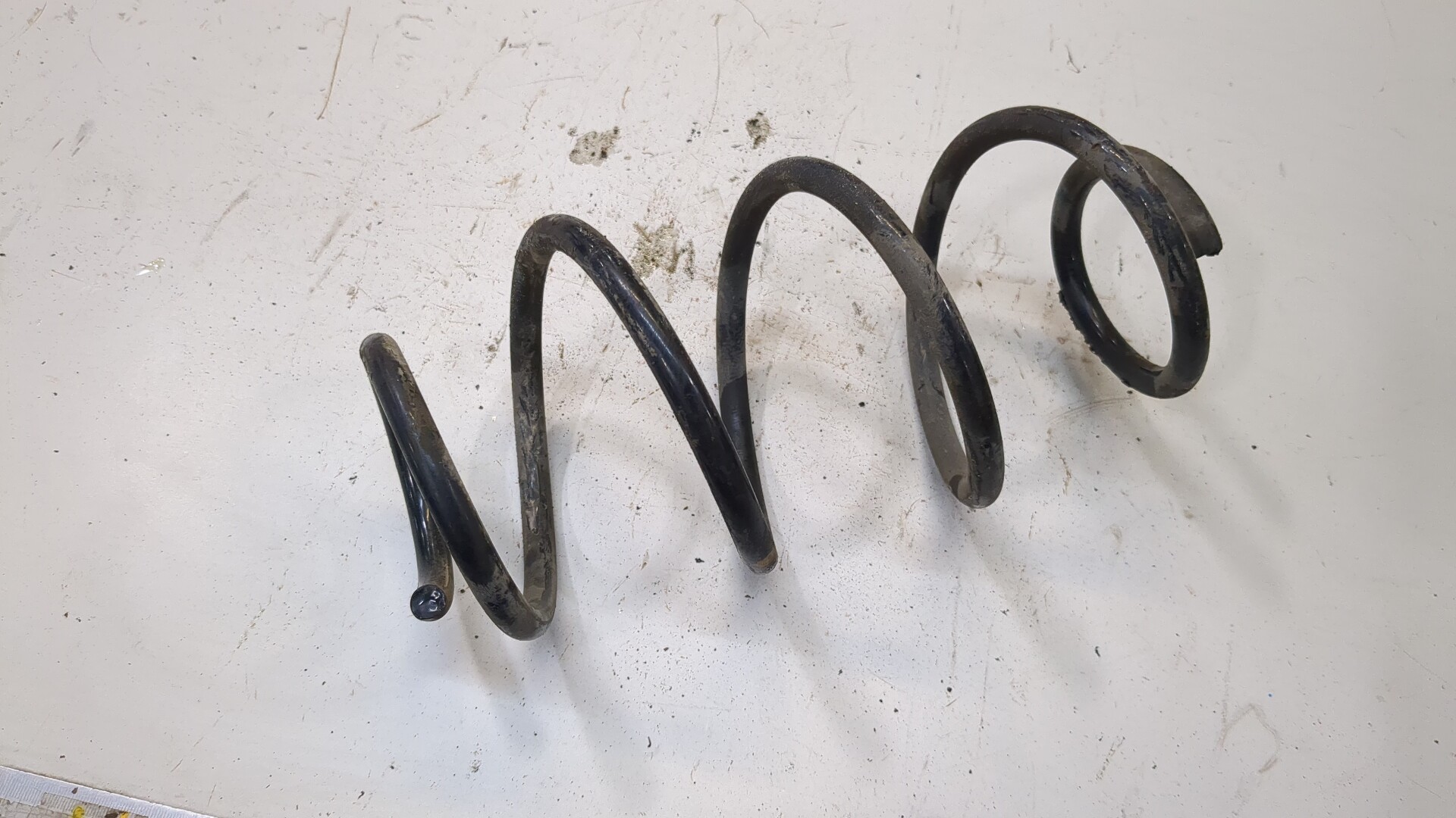 Пружина задняя