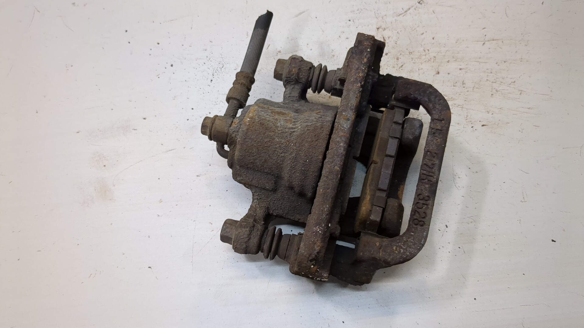 Суппорт задний левый