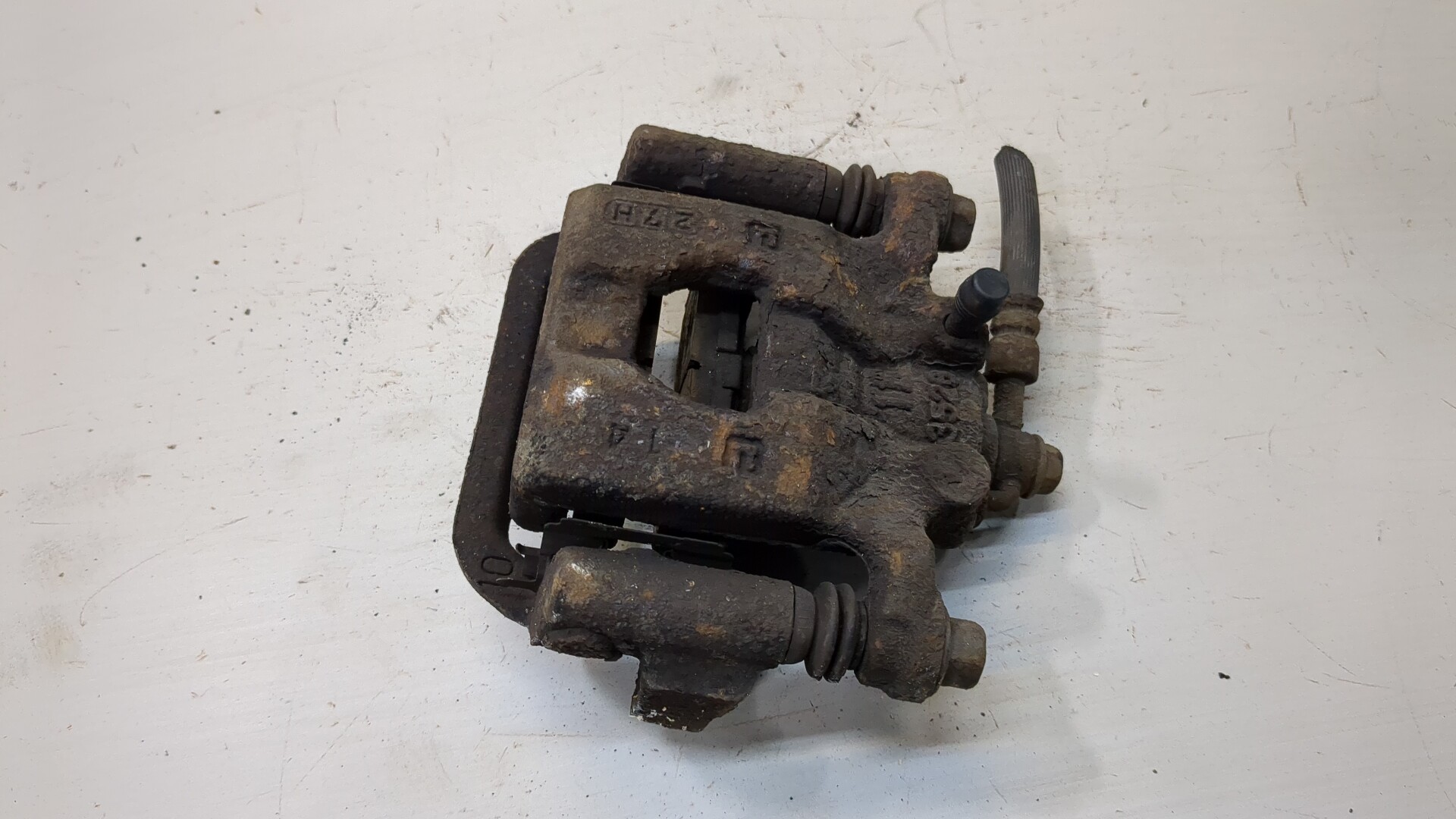 Суппорт задний левый