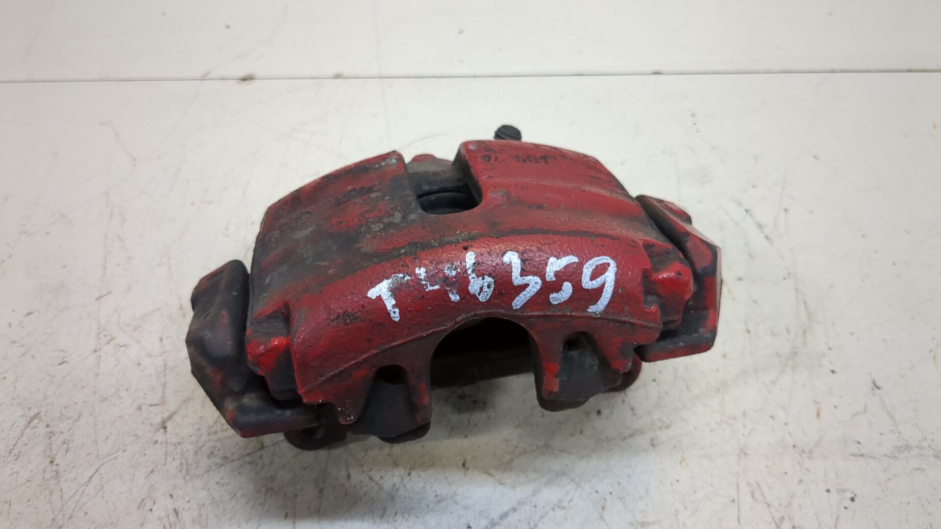 Суппорт передний левый