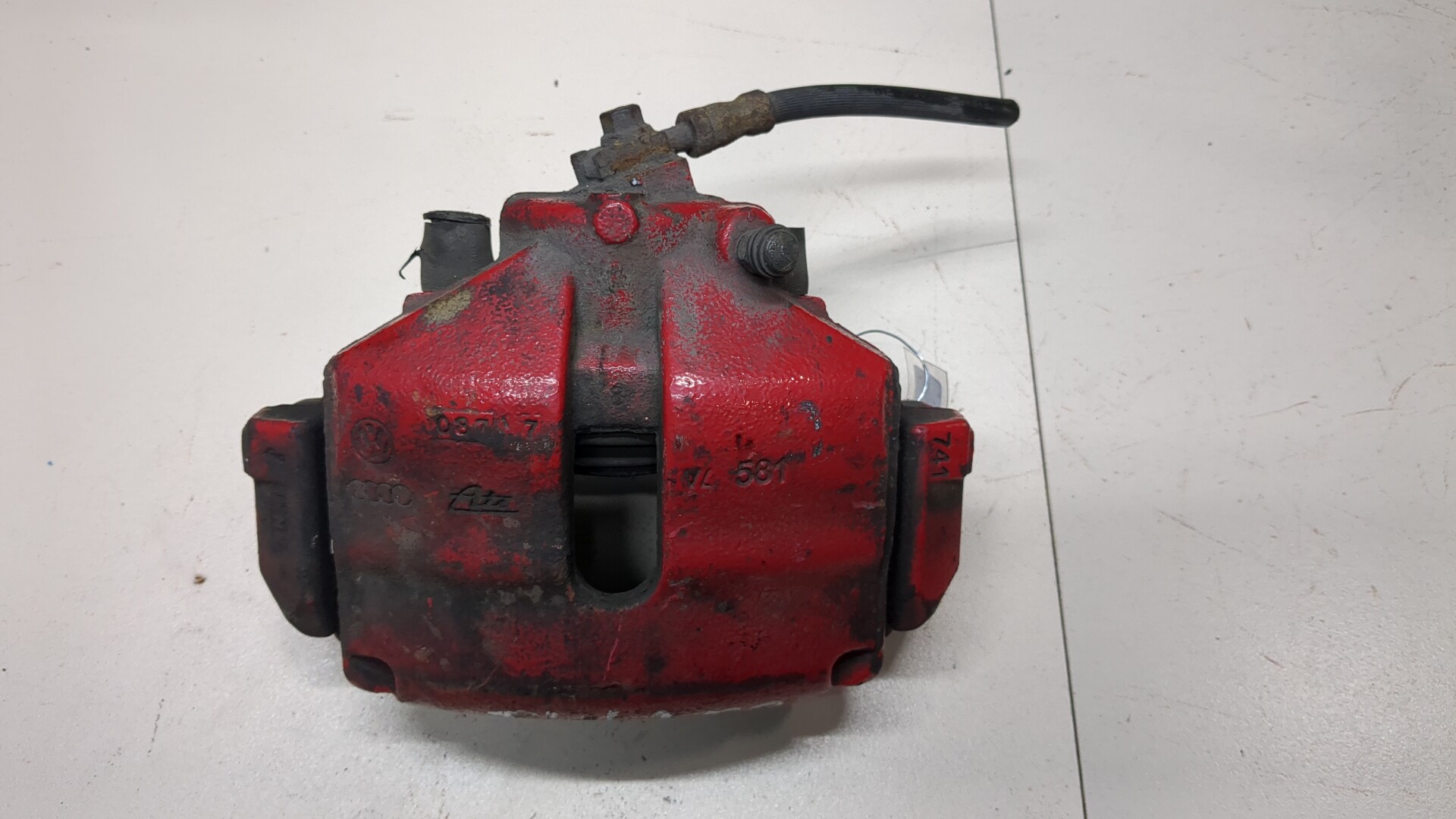 Суппорт передний левый